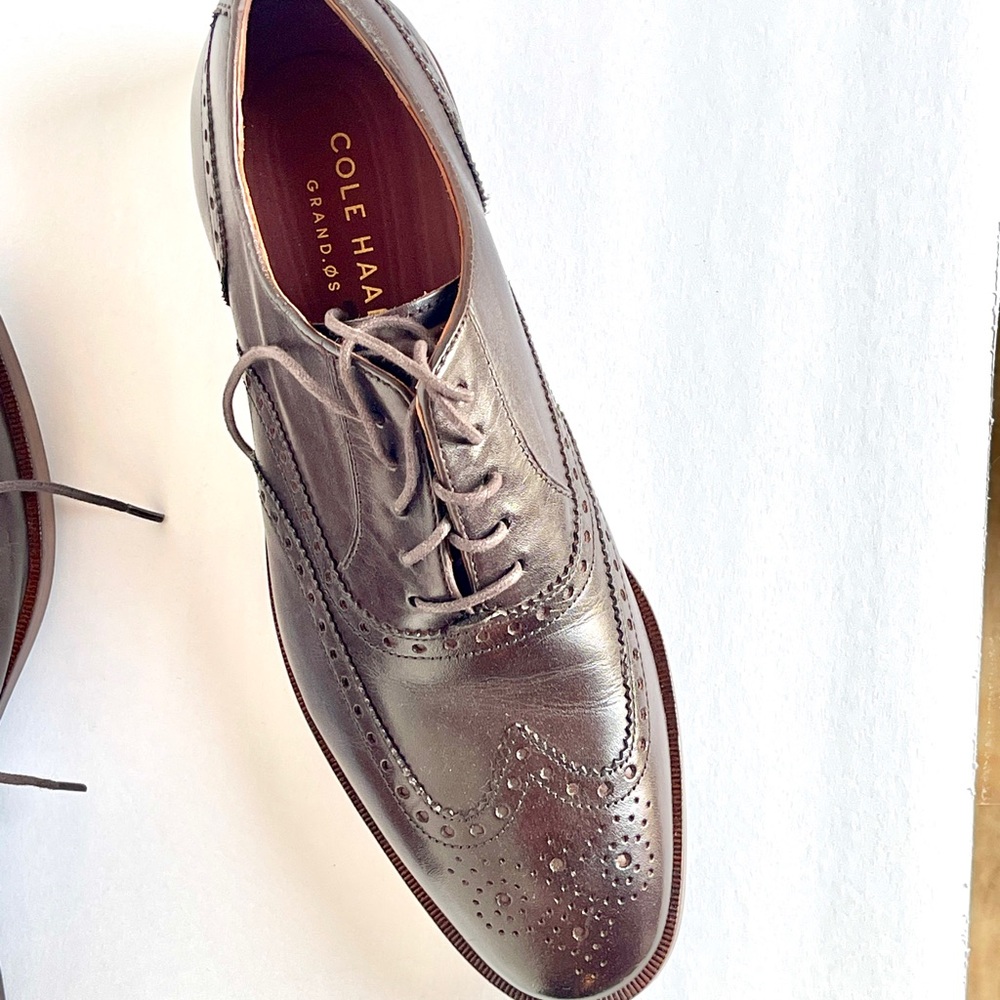 Cole Haan men’s brown Oxford dress shoes.